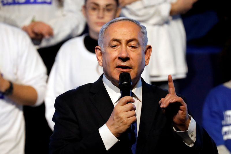 Israeli Prime Minister Benjamin Netanyahu speaks to supporters at a Likud party rally as he campaigns ahead of the upcoming elections, in Rishon Lezion near Tel Aviv, Israel