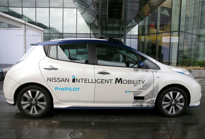 FILE PHOTO: A modified Nissan Leaf, driverless car, is seen during a pause in its first demonstration on public roads in Europe, in London