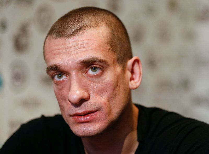 Russian artist Pavlensky speaks during interview in Kiev