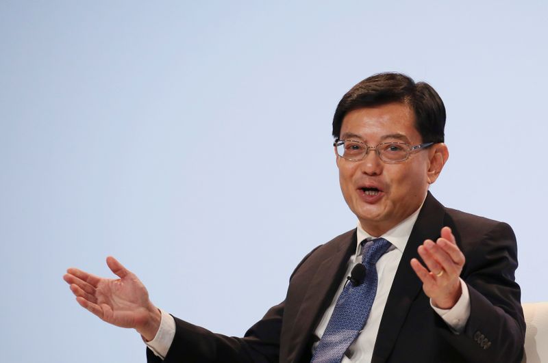 FILE PHOTO: Singapore's Finance Minister Heng Swee Keat speaks at a UBS client conference in Singapore