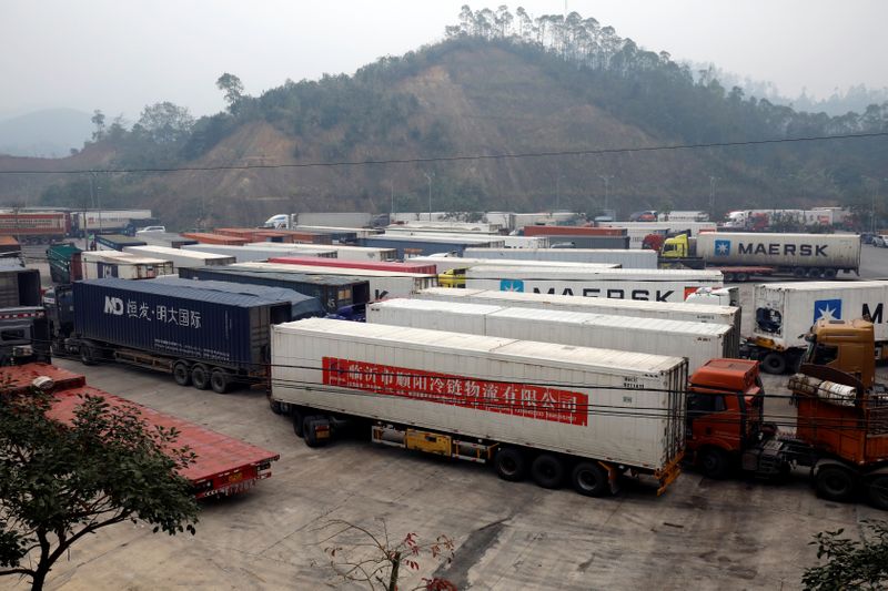 Container trucks are seen while waiting for cross the border at Huu Nghi border gate connecting with China, in Lang Son province, Vietnam