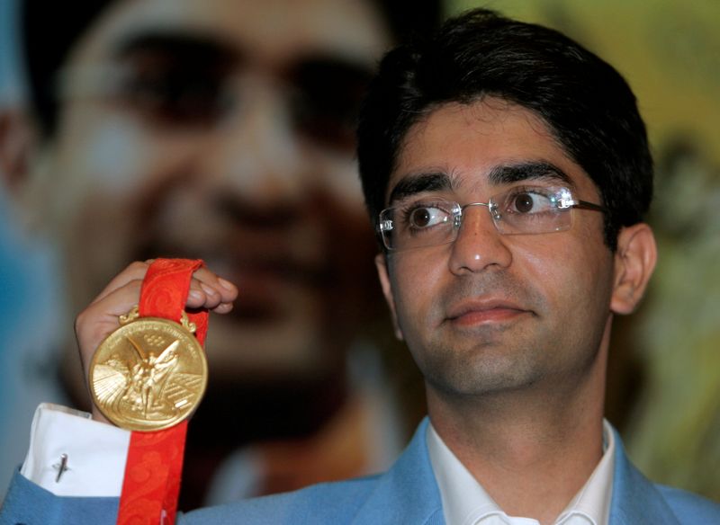 FILE PHOTO: Olympic men's 10m air rifle gold medalist Bindra shows his gold medal during news conference in New Delhi