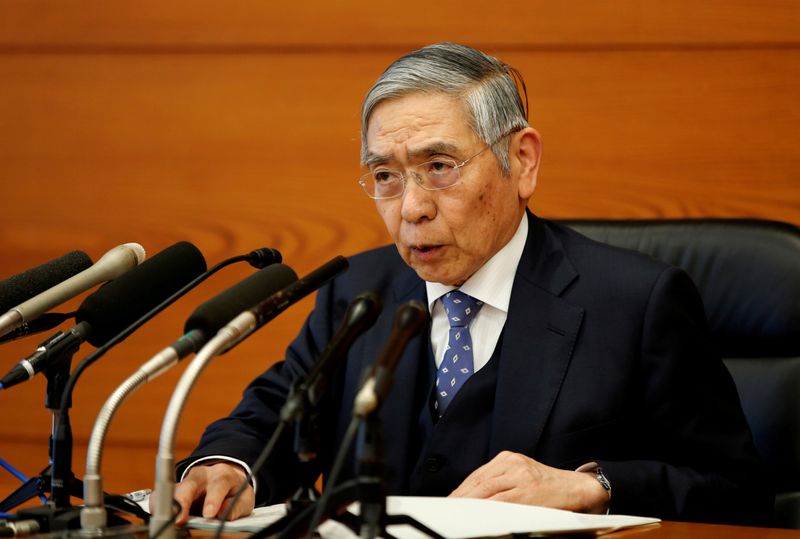 FILE PHOTO: Bank of Japan Governor Haruhiko Kuroda speaks at a news conference in Tokyo