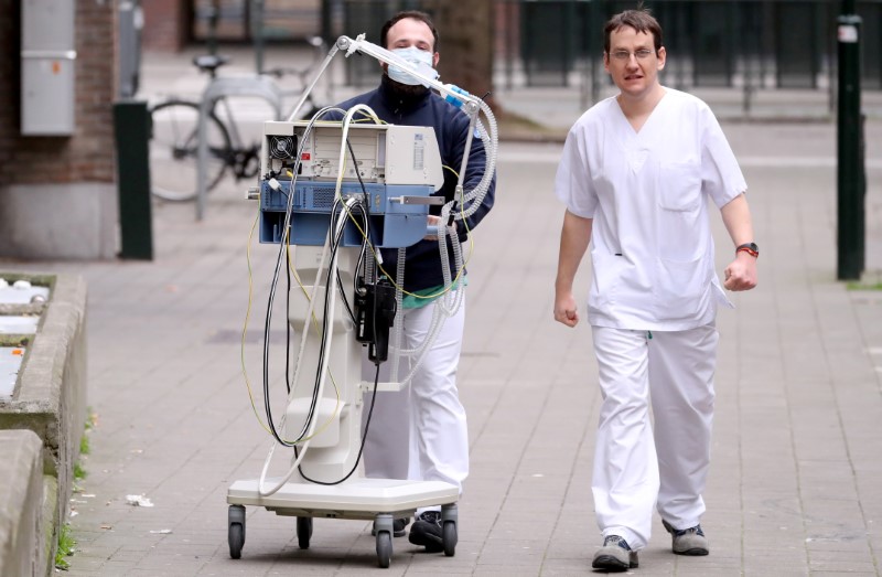 Medical personnel push a respirator at the Saint-Jean hospital while Belgian government imposed a coronavirus lockdown in an attempt to slow down the coronavirus disease (COVID-19), in Brussels