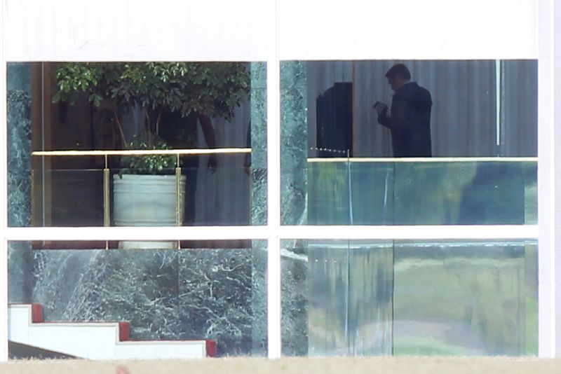 Brazil's President Jair Bolsonaro is seen at the Alvorada Palace, after reports of the coronavirus in Brasilia