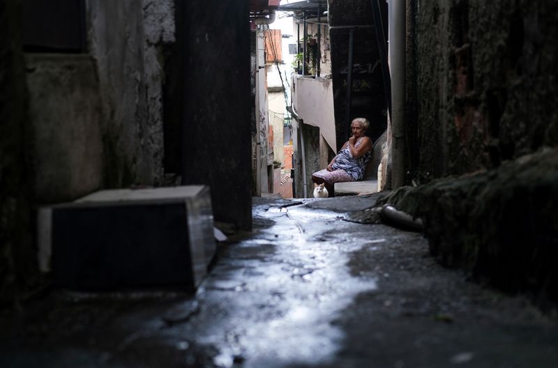 Maria das Neves, 76, is pictured in the Alemao slums complex during the coronavirus disease (COVID-19) outbreak, in Rio de Janeiro