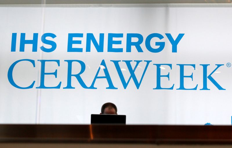 FILE PHOTO: Attendee works on a laptop at the annual IHS CERAWeek conference in Houston