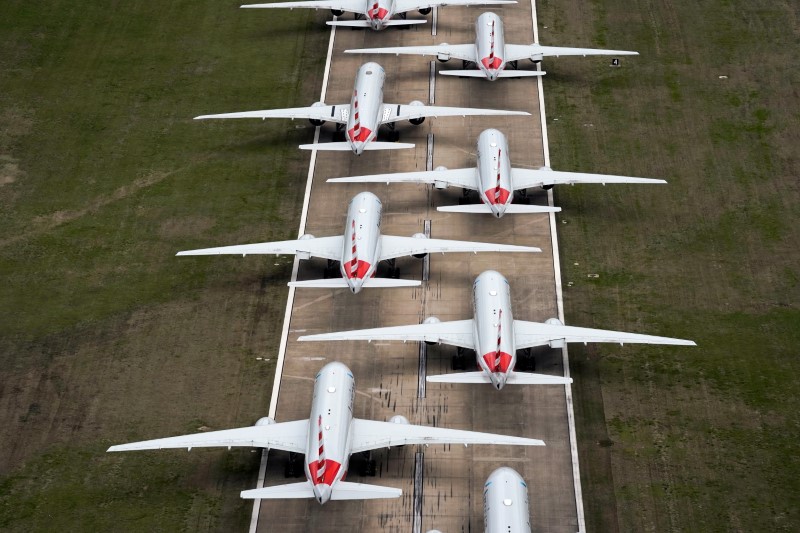 FILE PHOTO: American Airlines passenger planes crowd a runway where they are parked due to flight reductions to slow the spread of coronavirus disease (COVID-19), at Tulsa International Airport in Tulsa