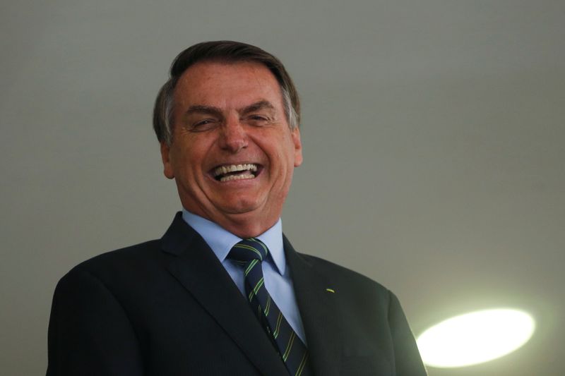 Brazil's President Jair Bolsonaro reacts before an inauguration ceremony of the new Culture Secretary Regina Duarte at the Planalto Palace, in Brasilia