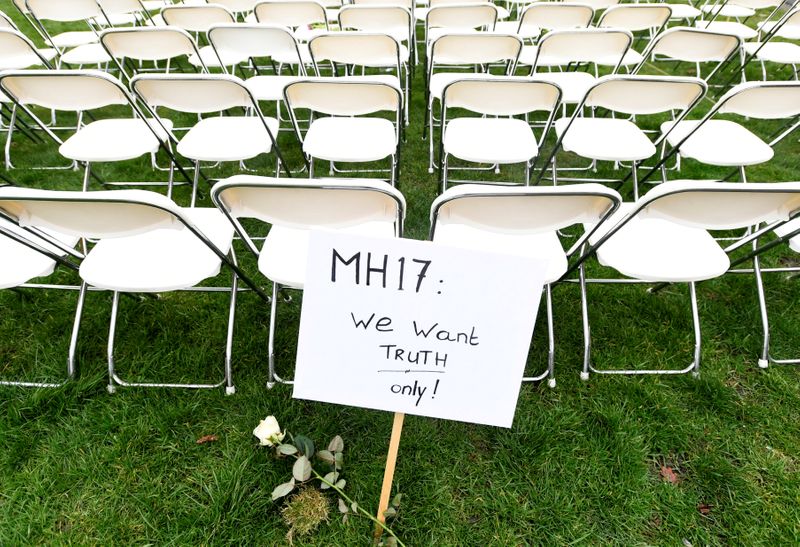 Family members of victims of the MH17 crash protest outside the Russian Embassy in The Hague