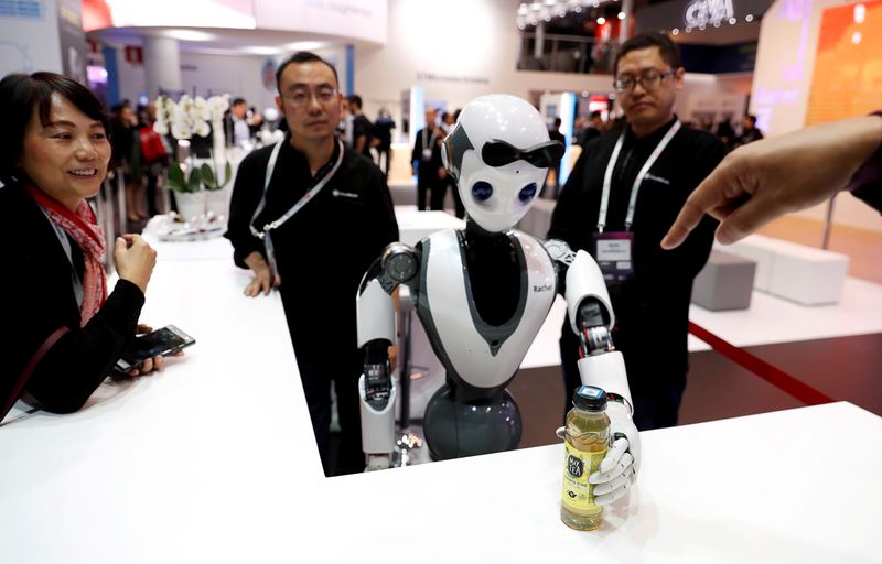 FILE PHOTO: The CloudMinds XR-1 robot performs for the visitors at the Mobile World Congress in Barcelona