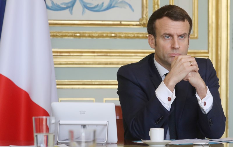 FILE PHOTO: French President Emmanuel Macron takes part in a videoconference of the 