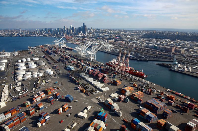 FILE PHOTO: An aerial photo shows the Seoul Express container ship docked at Harbor Island at the Port of Seattle in Seattle