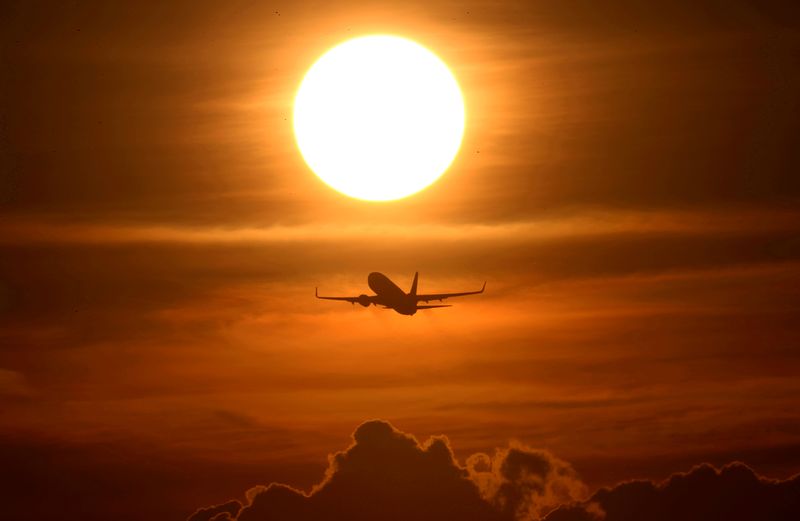 FILE PHOTO: An air plane takes off from the airport as air traffic is effected by the spread of the coronavirus disease (COVID-19) in Frankfurt