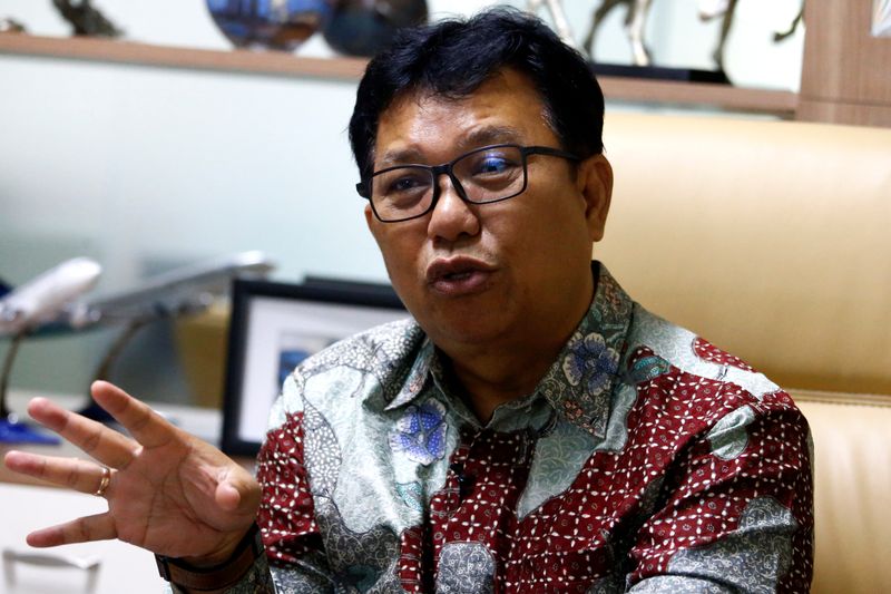 Chief Executive of Sulianti Saroso Hospital, Muhammad Syahril gestures as he talks during an interview at his office in Jakarta
