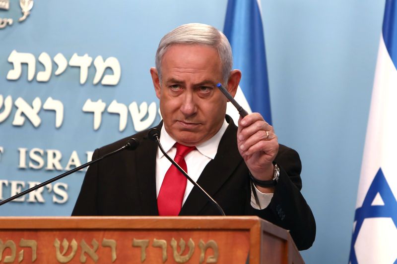 Israeli Prime Minister Benjamin Netanyahu delivers a speech at his Jerusalem office