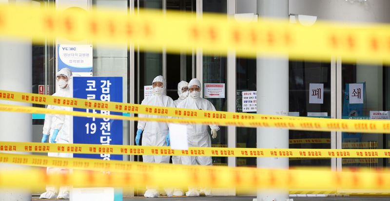 Medical workers are seen at a hospital in Daegu