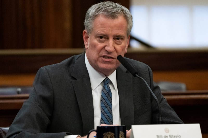 FILE PHOTO: New York City Mayor Bill de Blasio speaks during a news conference for the outbreak of Coronavirus disease (COVID-19) at City Hall in the Manhattan borough of New York