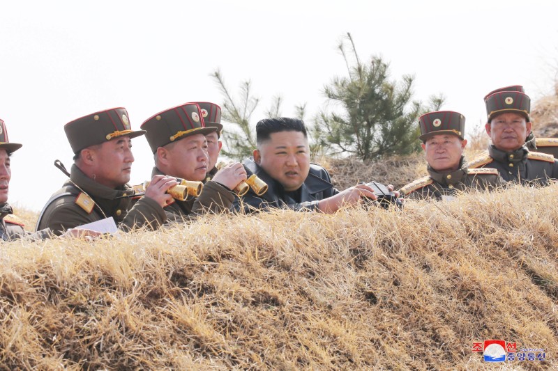 North Korean leader Kim Jong Un guides artillery fire competition in this image released by North Korea's Korean Central News Agency