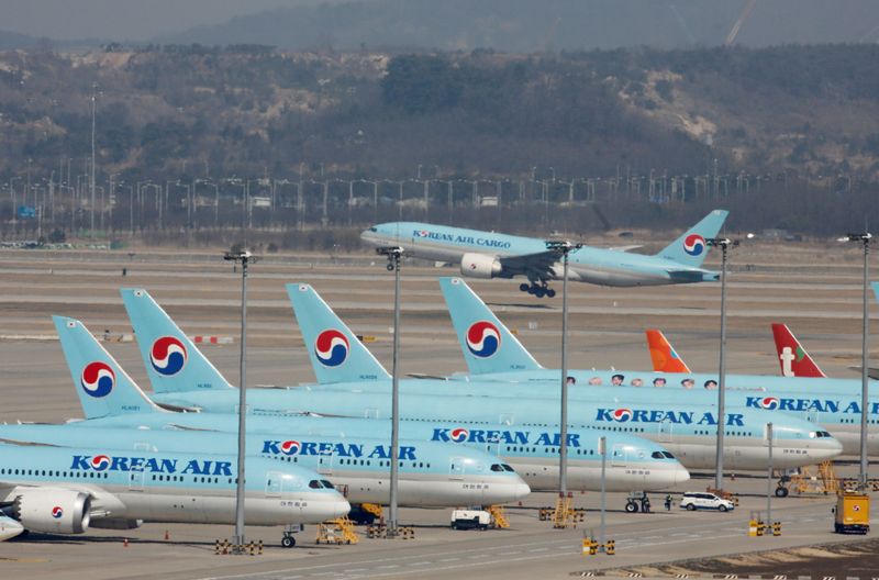 Korean Air's passenger planes are parked following outbreak of COVID-19, at Incheon International Airport