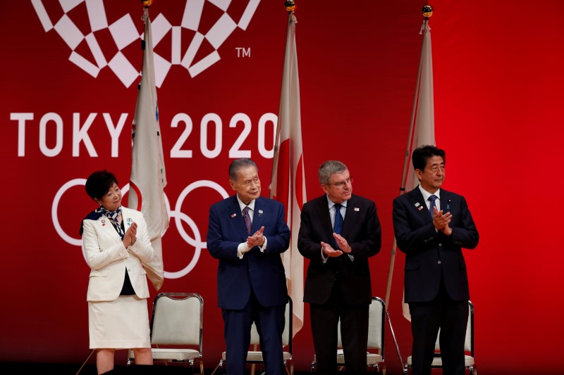 FILE PHOTO : Tokyo Governor Koike, Tokyo 2020 President Mori, IOC President Bach and Japan's PM Abe attend the 'One Year to Go' ceremony celebrating one year out from the start of the summer games in Tokyo