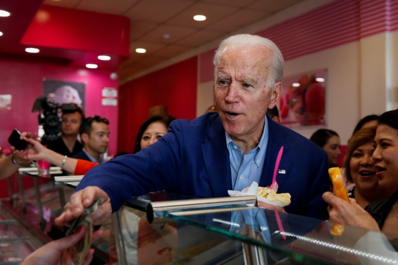 Democratic U.S. presidential candidate and former U.S. Vice President Biden pays for ice-cream during Super Tuesday in Los Angeles