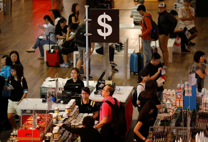 People shop at a pop-up store in Singapore