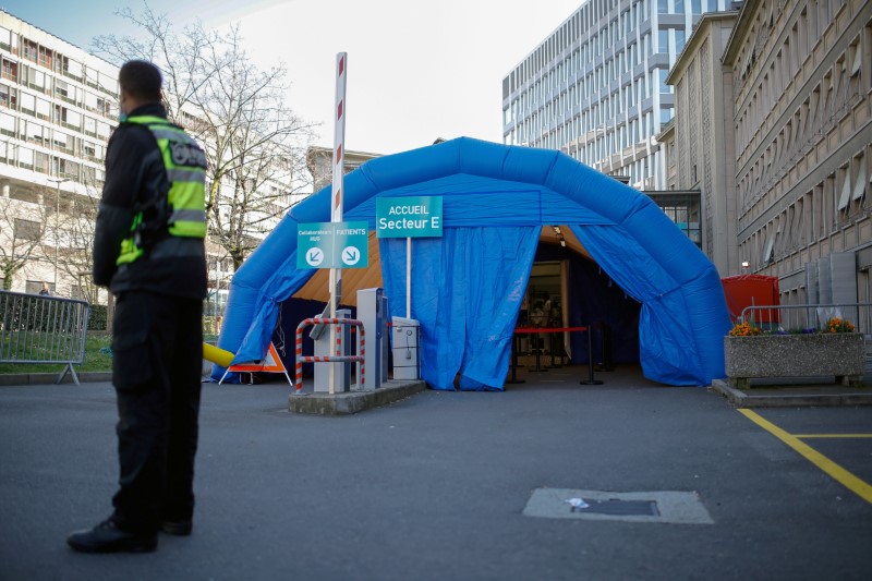 FILE PHOTO: Medical screening tent for coronavirus testing is seen outside HUG in Geneva