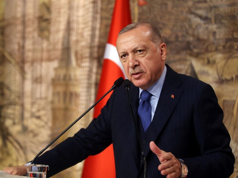 Turkish President Erdogan speaks during a meeting in Istanbul