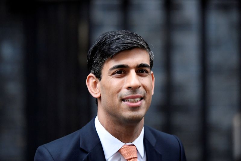 FILE PHOTO: Newly appointed Britain's Chancellor of the Exchequer Rishi Sunak leaves Downing Street in London