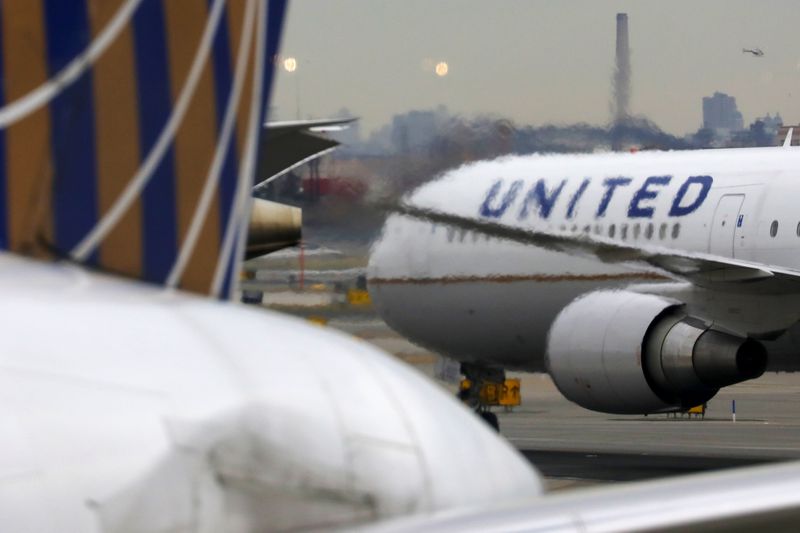 FILE PHOTO: A United Airlines passenger jet taxis at Newark Liberty International Airport