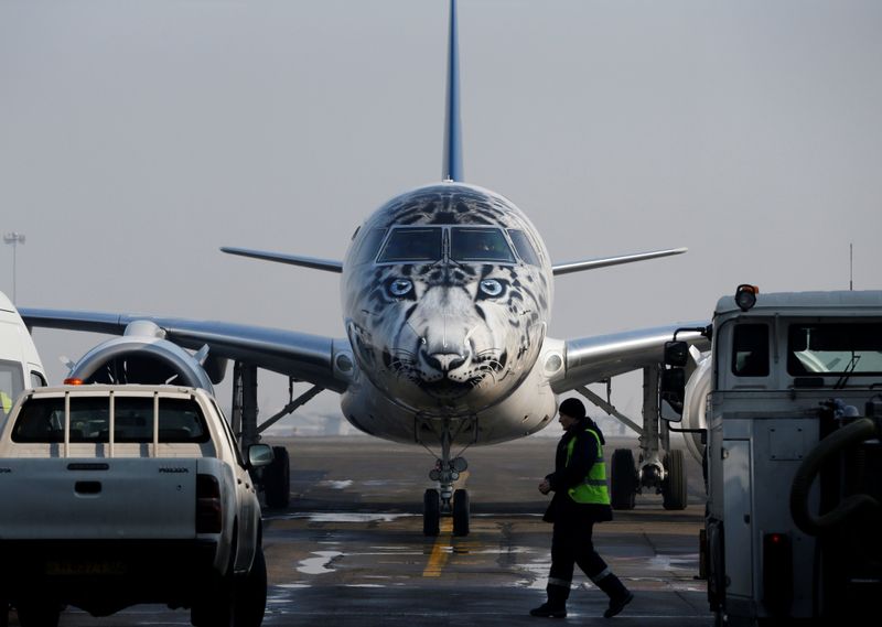 Air Astana Embraer E190-E2 aircraft with a snow leopard livery is seen at Almaty International Airport