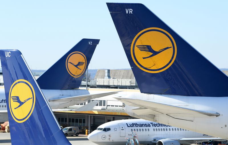 FILE PHOTO: Airplanes of German carrier Lufthansa are parked on the tarmac as air traffic is affected by the spread of the coronavirus disease (COVID-19), in Frankfurt, Germany