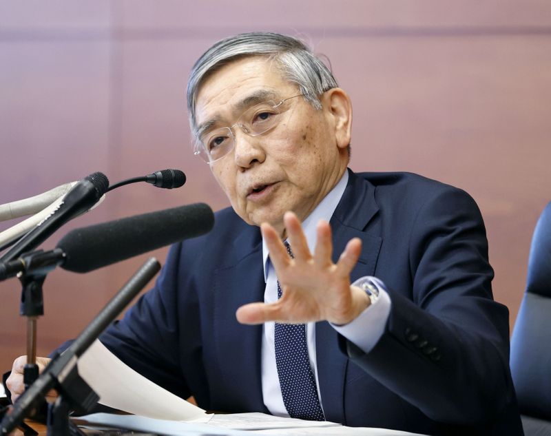 FILE PHOTO: Bank of Japan Governor Haruhiko Kuroda attends a news conference in Tokyo, Japan
