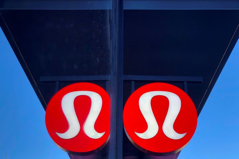 FILE PHOTO: A sign for a Lululemon retail shop is reflected in the store's window at a shopping mall in San Diego
