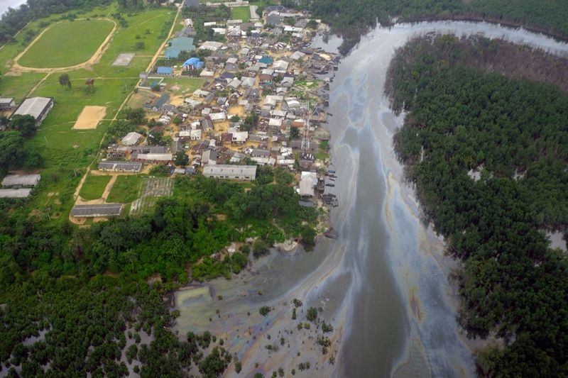 FILE PHOTO: An aerial view shows oil-slicked waterways in the city of Port Harcourt, in Rivers State