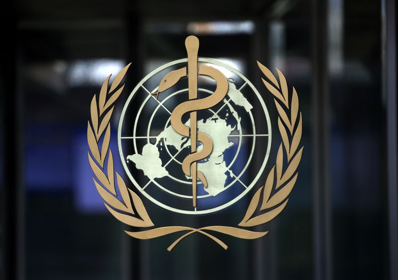 FILE PHOTO: A logo is pictured on the headquarters of the WHO in Geneva