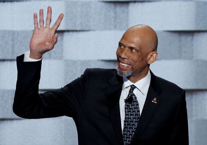FILE PHOTO: NBA basketball Hall of Famer Abdul-Jabaar waves before speaking on the final night of the Democratic National Convention in Philadelphia
