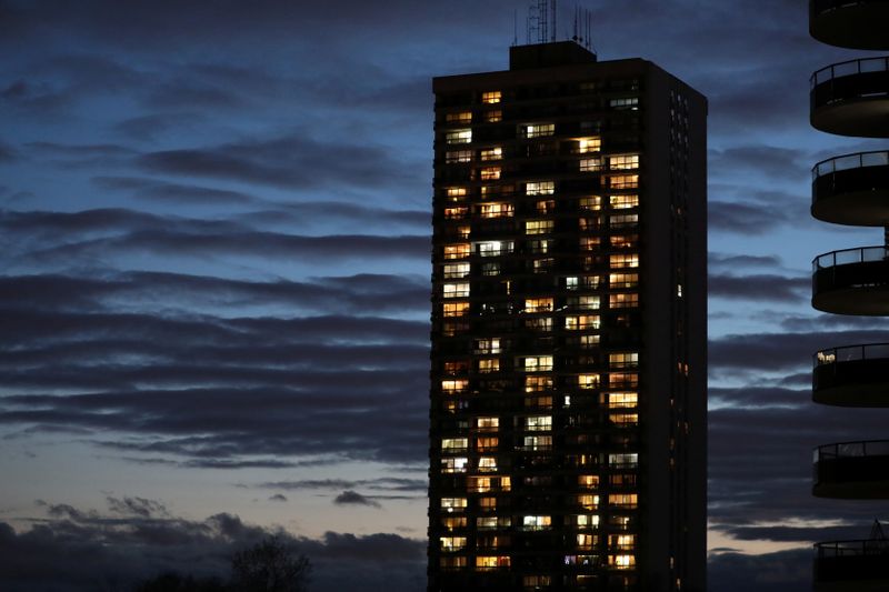 Lights shine from apartments in a residential building during the global outbreak of coronavirus disease in Toronto