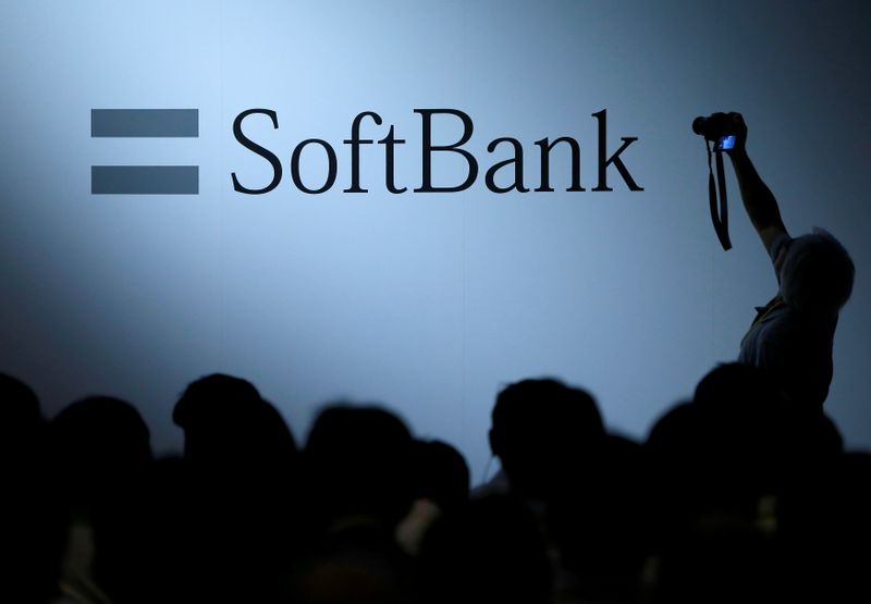 FILE PHOTO: The logo of SoftBank Group Corp is displayed at the SoftBank World 2017 conference in Tokyo