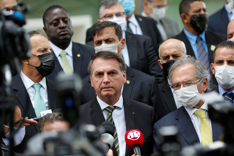 Brazil's President Jair Bolsonaro speaks with journalists after a meeting with President of Brazil's Supreme Federal Court Dias Toffoli, amid the coronavirus disease (COVID-19) outbreak, at the Supreme Federal Court in Brasilia