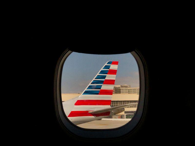 An American Airlines airplane sits on the tarmac at LAX in Los Angeles