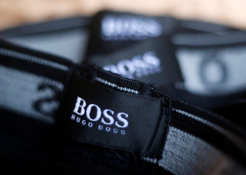 FILE PHOTO: The logo of German fashion house Hugo Boss is seen on a clothing label at their outlet store in Mezingen near Stuttgart