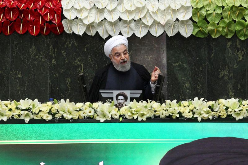 FILE PHOTO: Iranian President Hassan Rouhani speaks during the opening ceremony of Iran's 11th parliament, as the spread of the coronavirus disease (COVID-19) continues, in Tehran