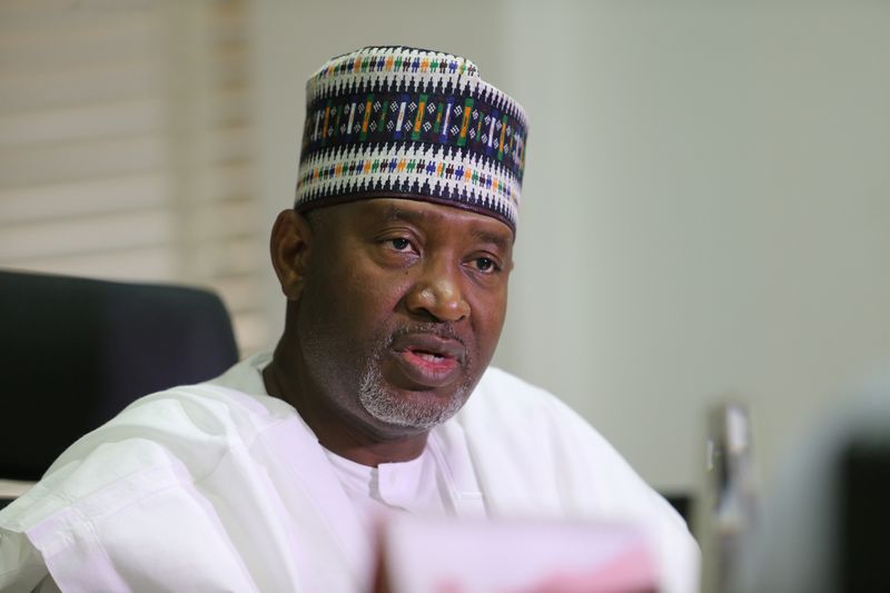 FILE PHOTO: Hadi Sirika, Nigeria's minister of state on aviation, speaks during an interview with Reuters in Abuja, Nigeria