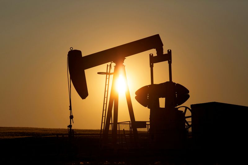FILE PHOTO: FILE PHOTO: An oil pump jack pumps oil in a field near Calgary