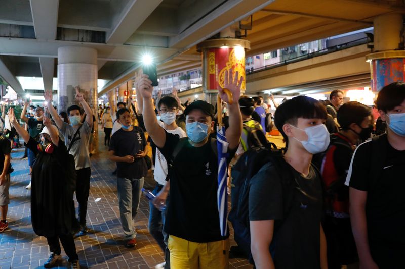Anti-government protesters march against Beijing's plans to impose national security legislation in Hong Kong