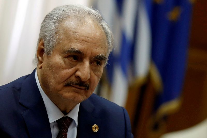 FILE PHOTO: Libyan commander Khalifa Haftar meets Greek Prime Minister Kyriakos Mitsotakis (not pictured) at the Parliament in Athens