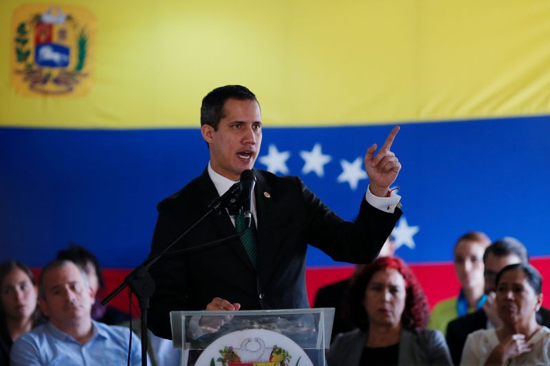 FILE PHOTO: Venezuelan opposition leader Juan Guaido, who many nations have recognised as the country's rightful interim ruler, speaks during conference in Caracas