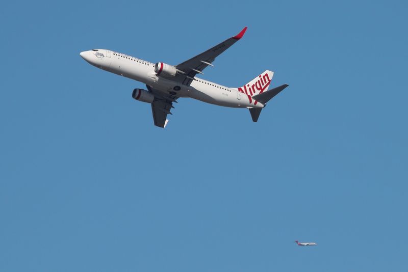 FILE PHOTO: A Virgin Australia Airlines plane takes off from Kingsford Smith International Airport in Sydney
